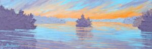 A gorgeous sunset over a peaceful evening scene